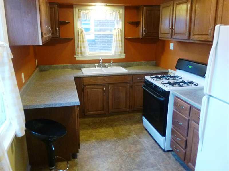 543 Ridge Road Ambridge, PA 15003 - Photo 12 of 23 Kitchen. Freshly updated kitchen - Newer flooring, countertops, sink, overhang for breakfast bar stool & more. Gas stove & fridge included with house.