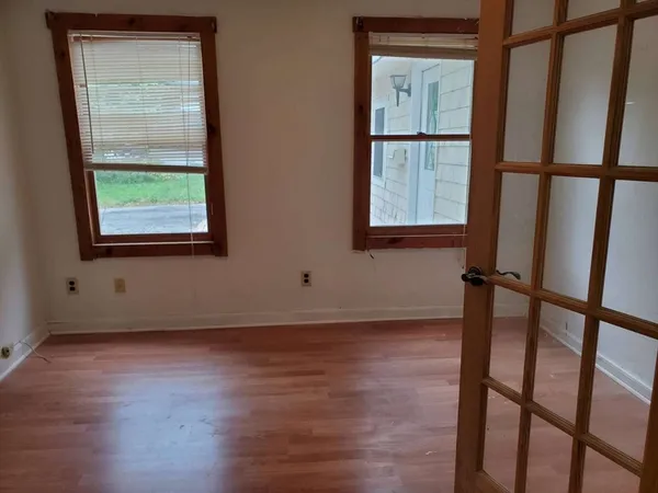 wooden floor and windows in a room
