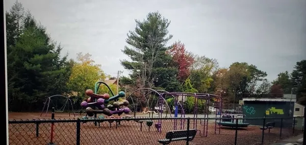 a view of a gate with a street