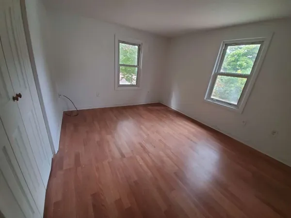 a view of a livingroom with a workspace