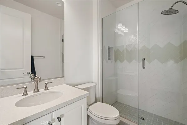 a living room with furniture wooden floor and a chandelier