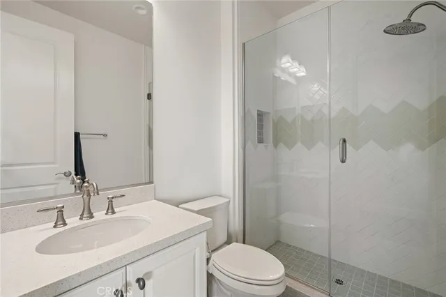 a living room with furniture wooden floor and a chandelier