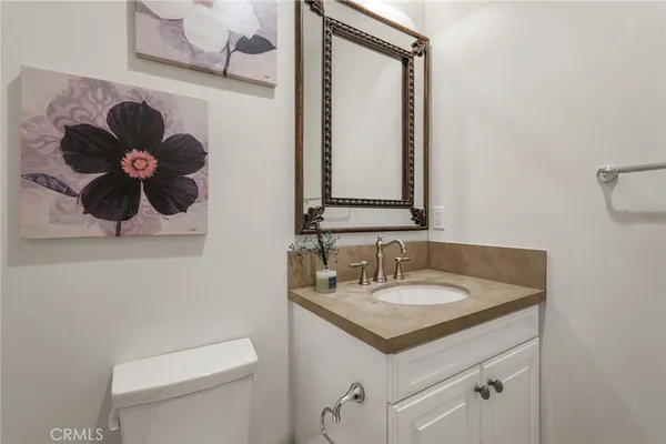 a spacious bedroom with a bed and a window