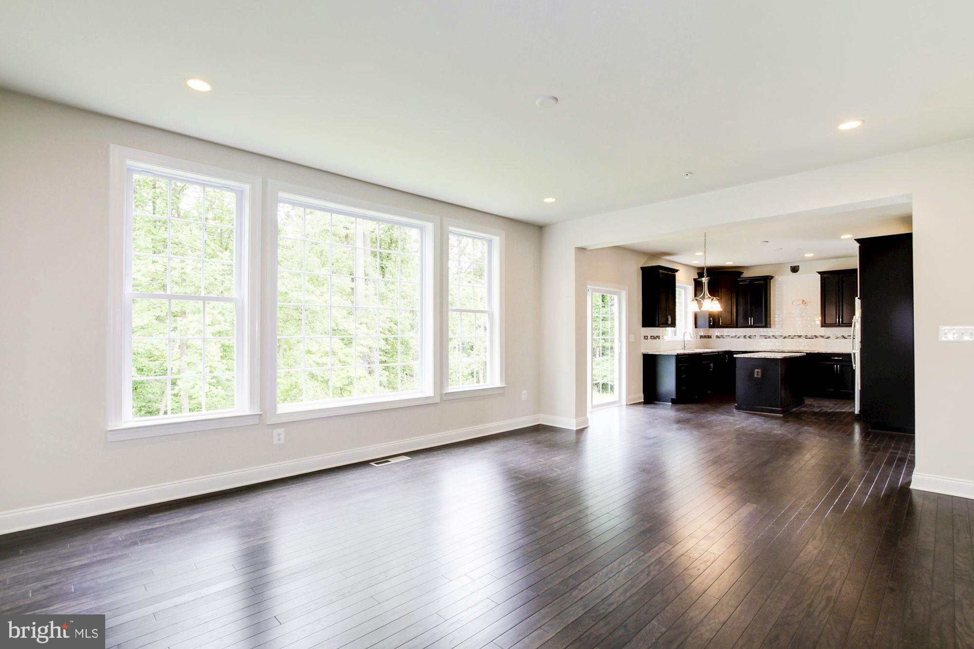1603 Stream Valley Overlook Severn, MD 21144 - Photo 16 of 43 Woodstock Family Room-Kitchen