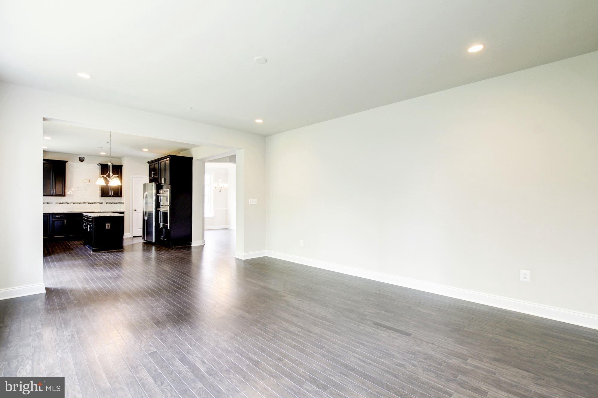 1603 Stream Valley Overlook Severn, MD 21144 - Photo 22 of 43 Woodstock Family Room