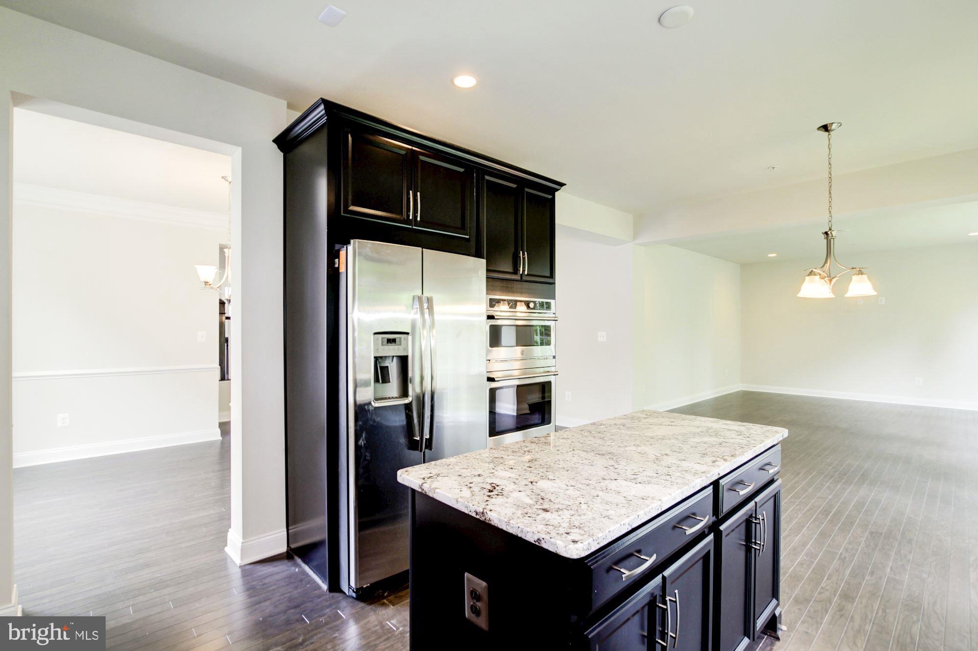 1603 Stream Valley Overlook Severn, MD 21144 - Photo 7 of 43 Woodstock Kitchen-Dining Room
