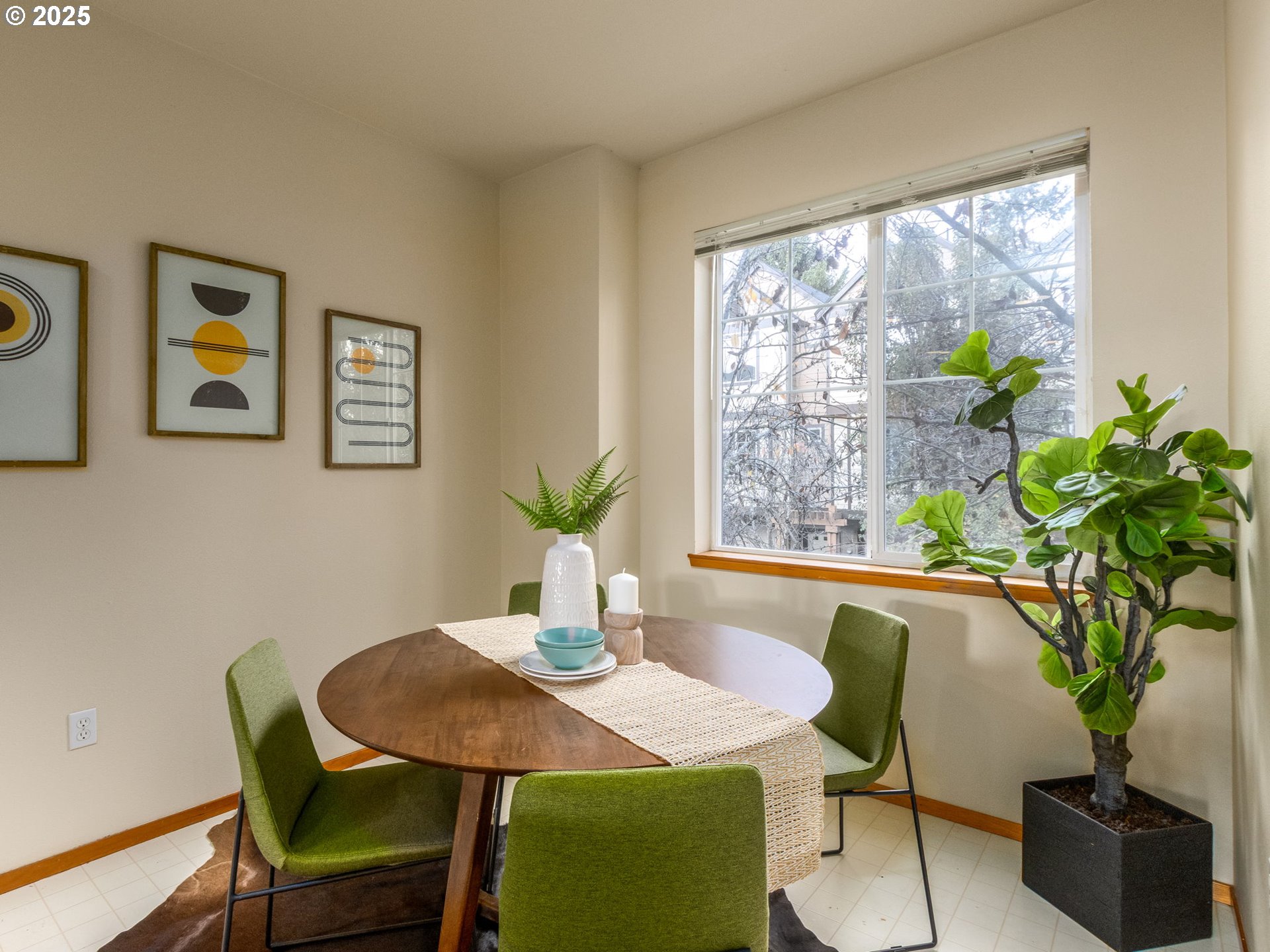 606 Southwest Dillan Drive Beaverton, OR 97006 - Photo 14 of 29 a view of a dining room with furniture window and wooden floor