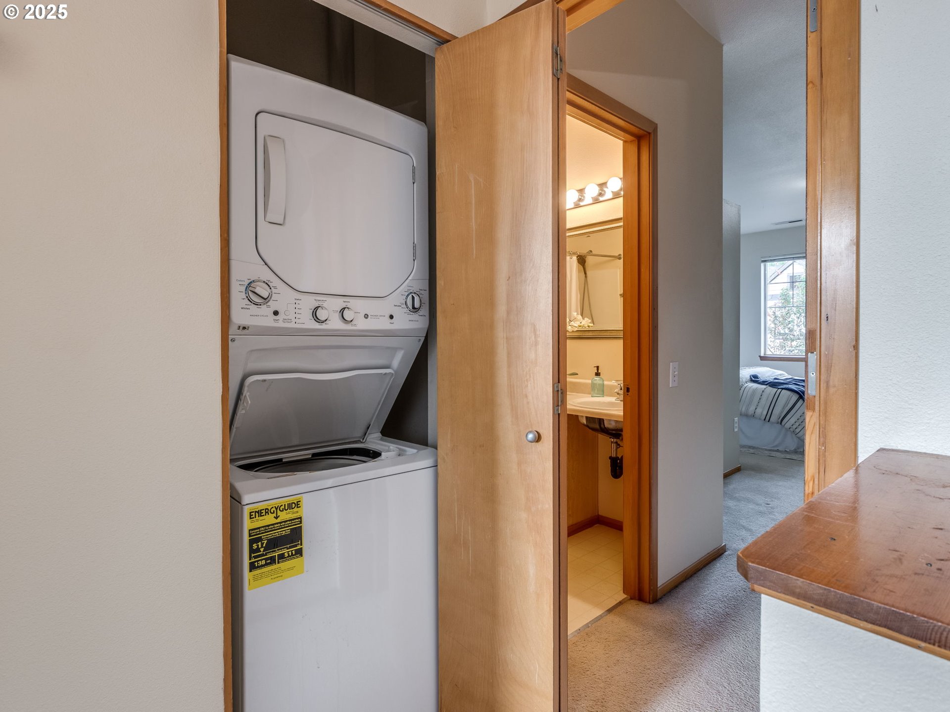 606 Southwest Dillan Drive Beaverton, OR 97006 - Photo 17 of 29 a room that has a washer and dryer