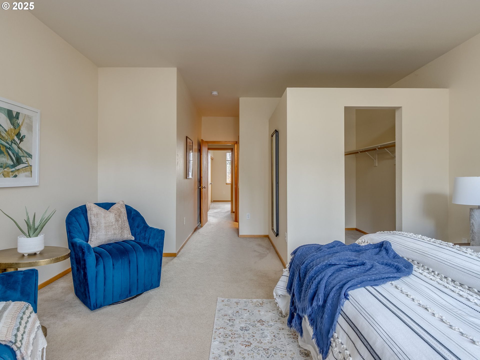 606 Southwest Dillan Drive Beaverton, OR 97006 - Photo 20 of 29 a bedroom with a bed and a couch