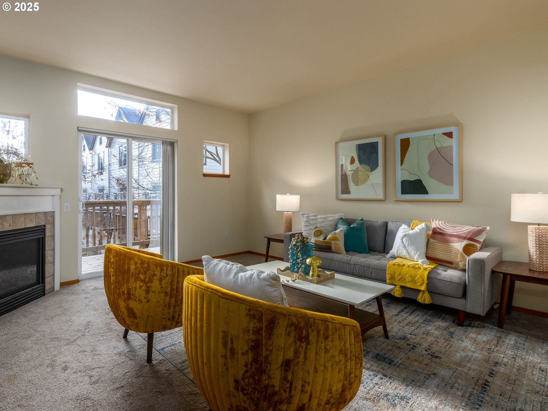 606 Southwest Dillan Drive Beaverton, OR 97006 - Photo 2 of 29 a living room with furniture and a fireplace