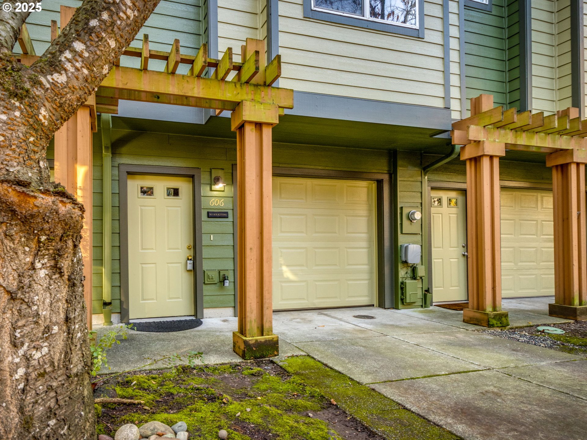 606 Southwest Dillan Drive Beaverton, OR 97006 - Photo 28 of 29 a front view of a house with a garage