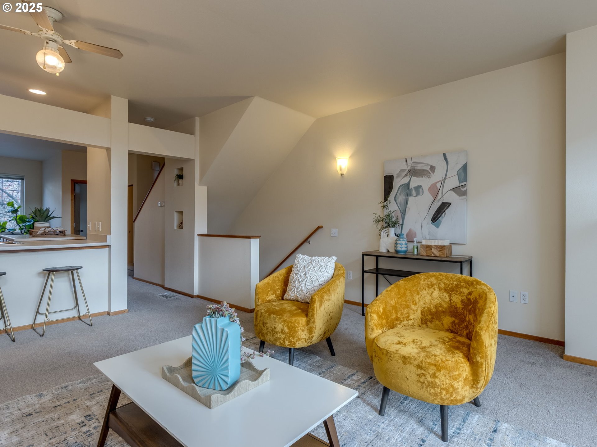 606 Southwest Dillan Drive Beaverton, OR 97006 - Photo 4 of 29 a living room with table and a couch