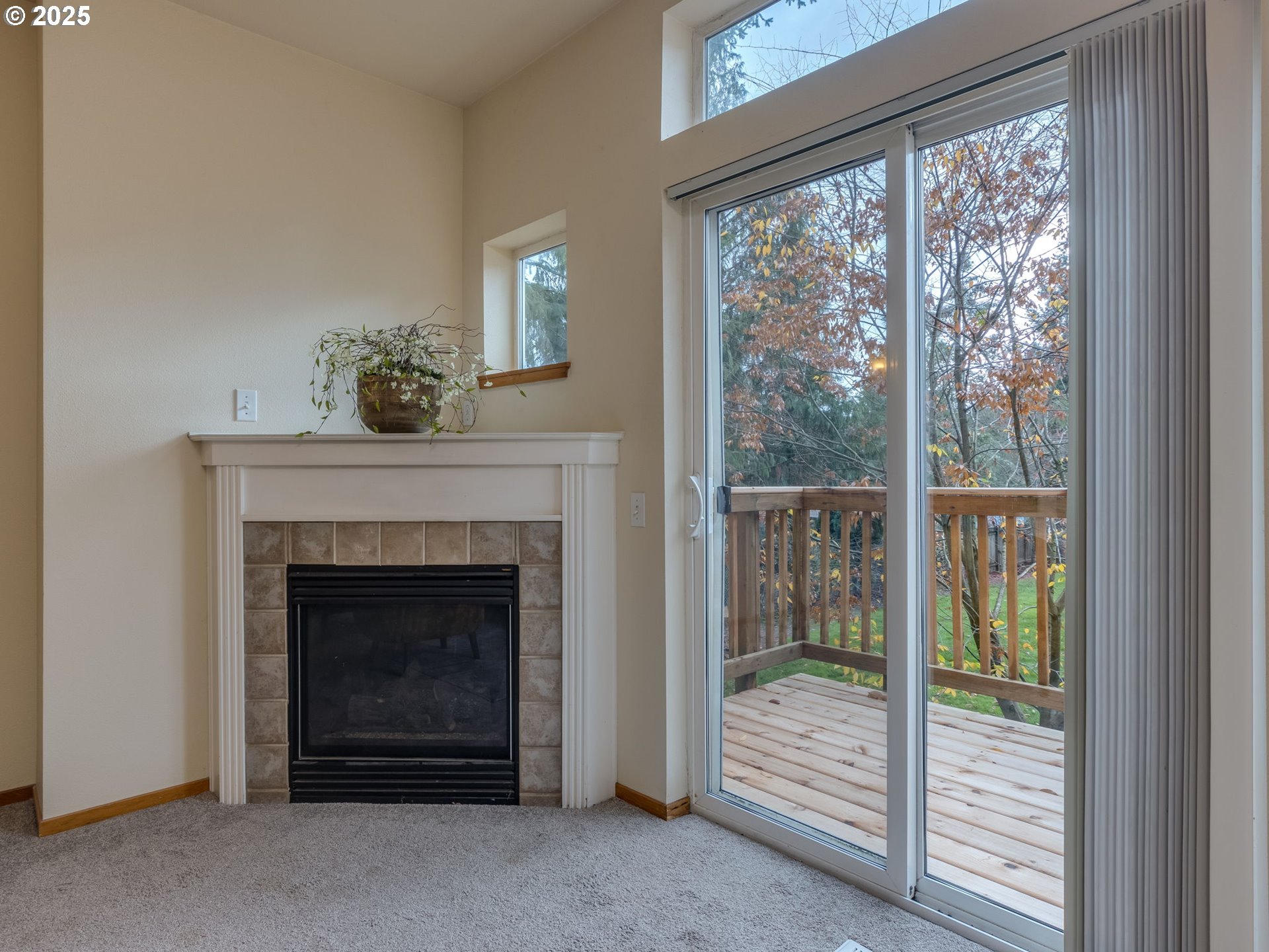 606 Southwest Dillan Drive Beaverton, OR 97006 - Photo 5 of 29 a living room with a fireplace