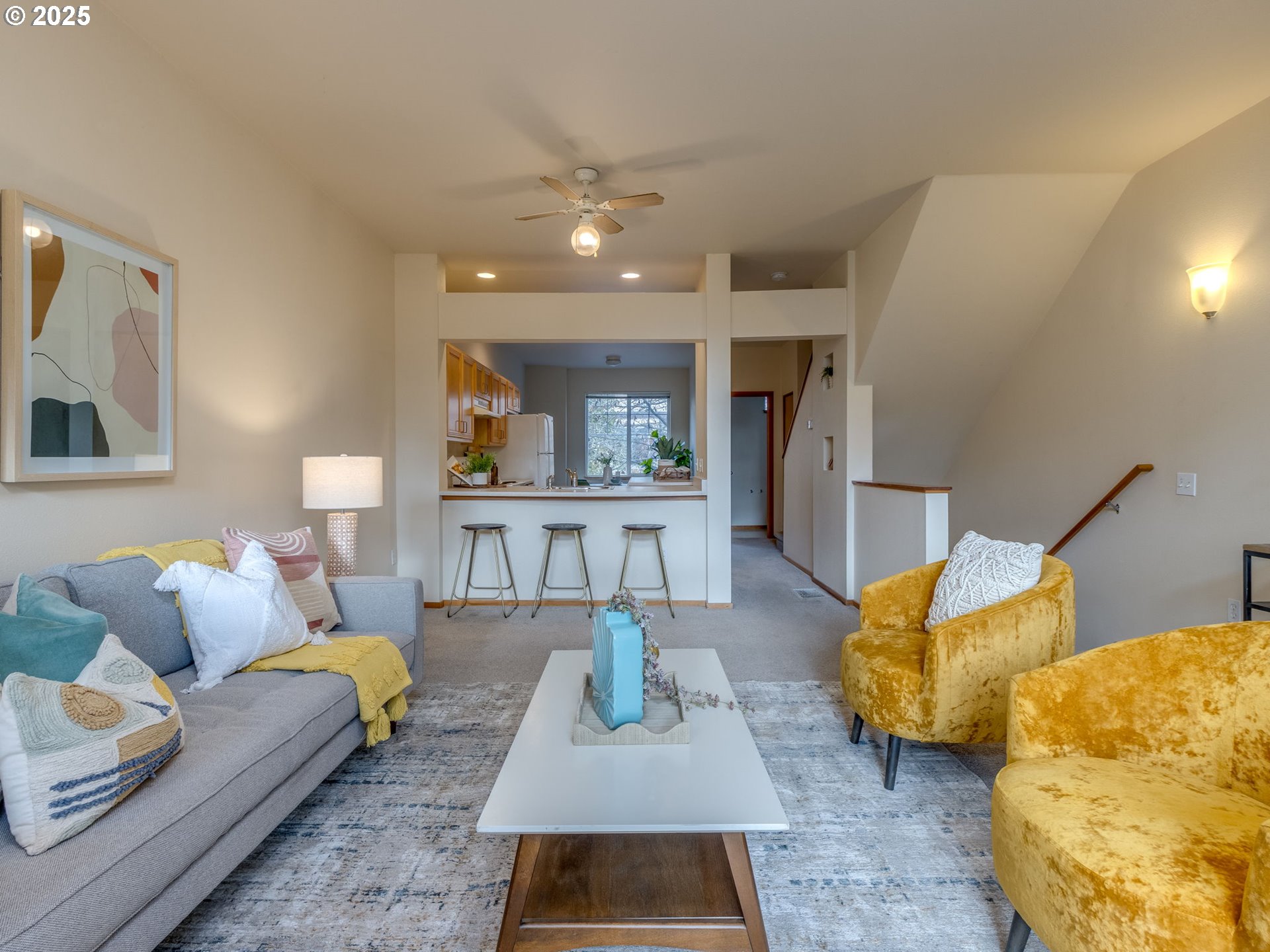 606 Southwest Dillan Drive Beaverton, OR 97006 - Photo 8 of 29 a living room with furniture and a lamp