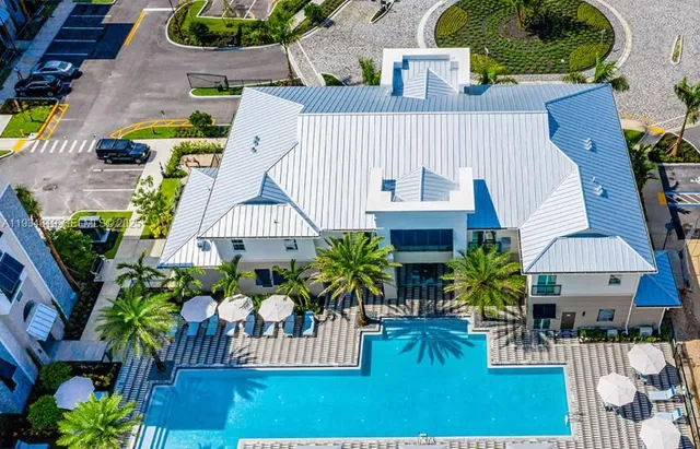 a view of a house with a swimming pool