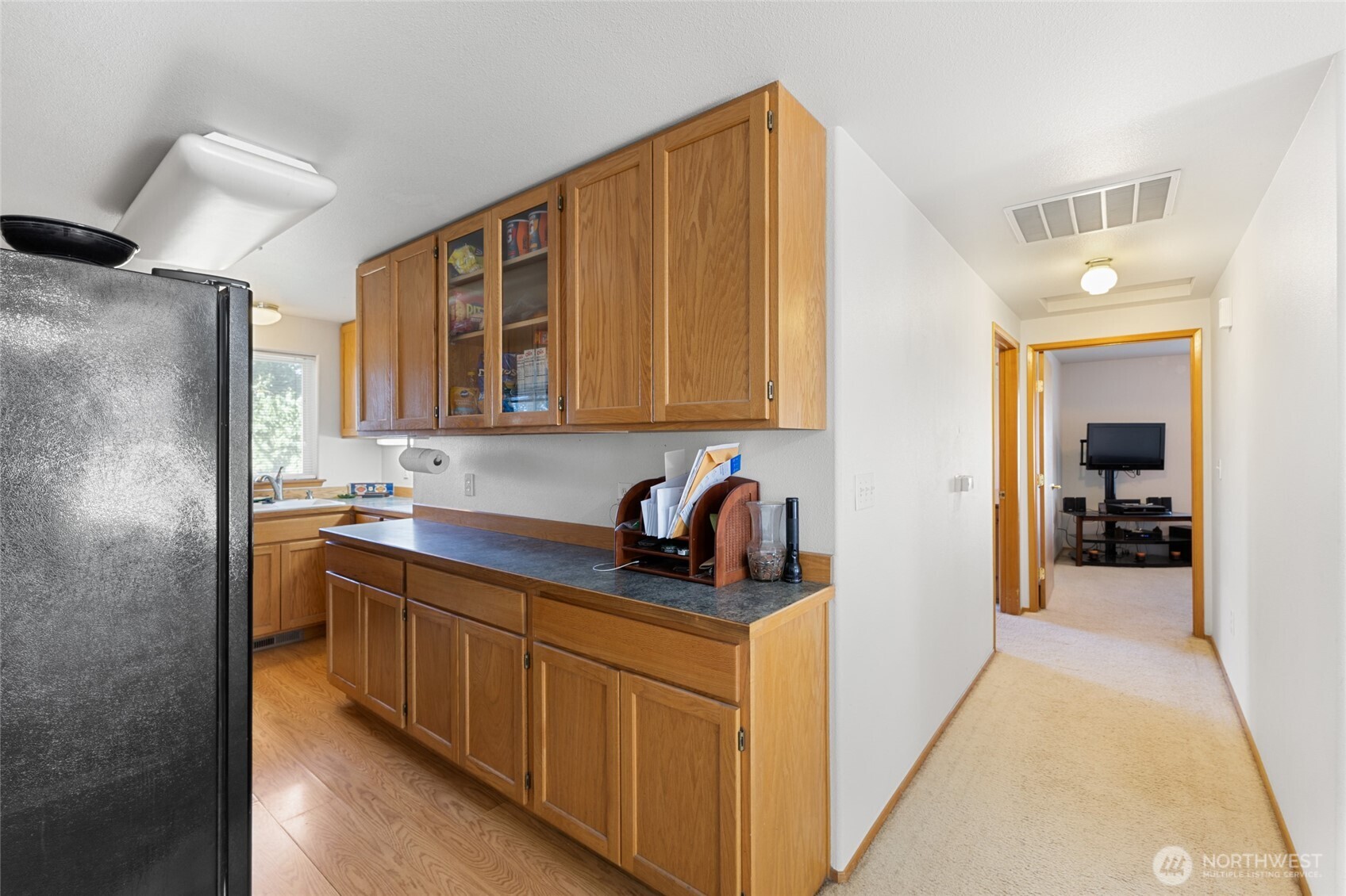 2299 Admiral Road Northeast Moses Lake, WA 98837 - Photo 22 of 40 a kitchen with stainless steel appliances granite countertop a sink stove and refrigerator
