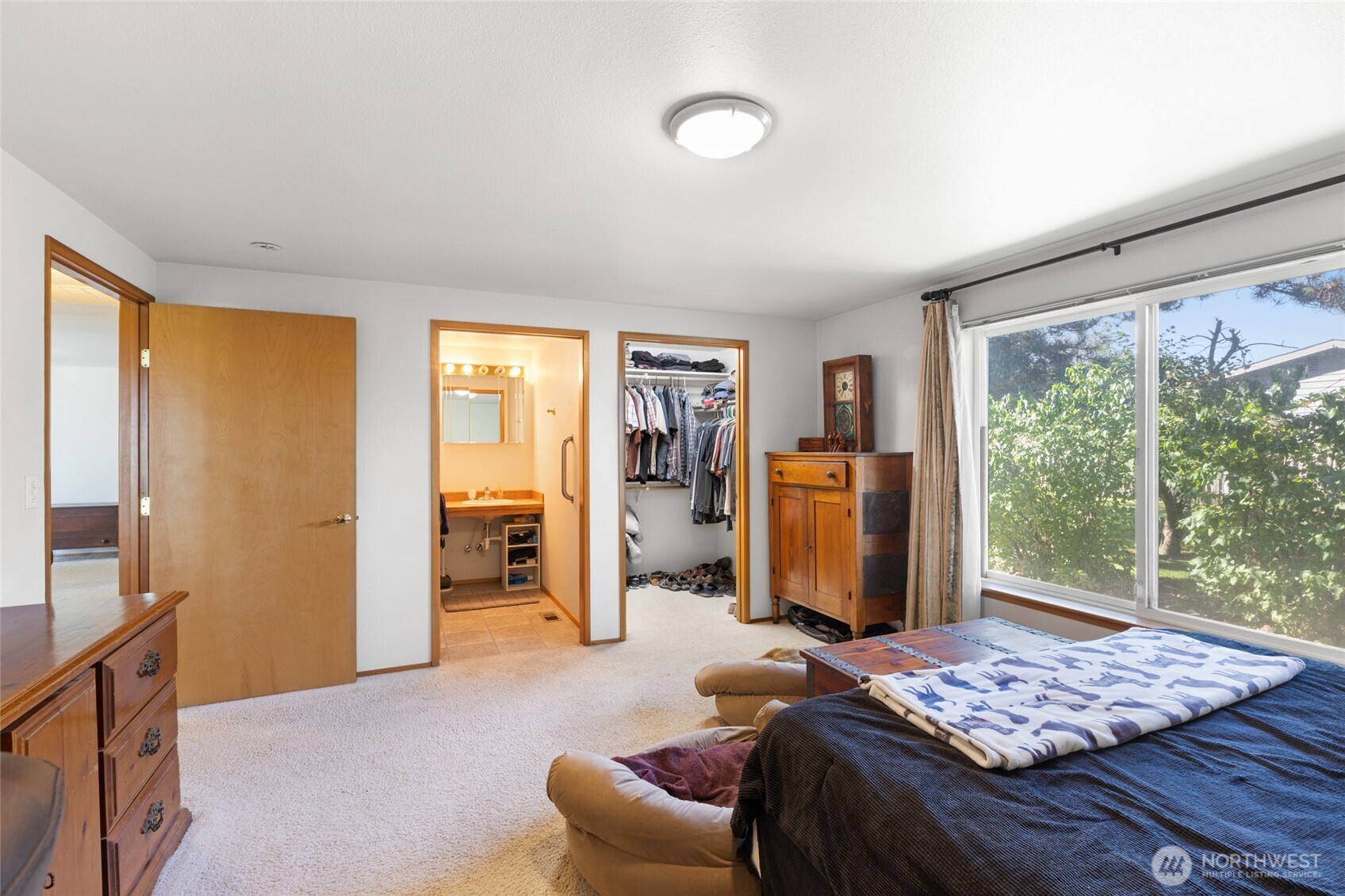 2299 Admiral Road Northeast Moses Lake, WA 98837 - Photo 25 of 40 a bedroom with furniture and a window