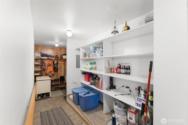 a view of a house with backyard and porch