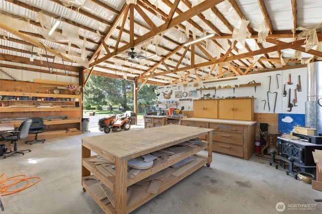 a view of a patio with a table and chairs