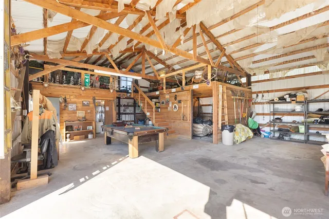 a view of house with backyard and patio