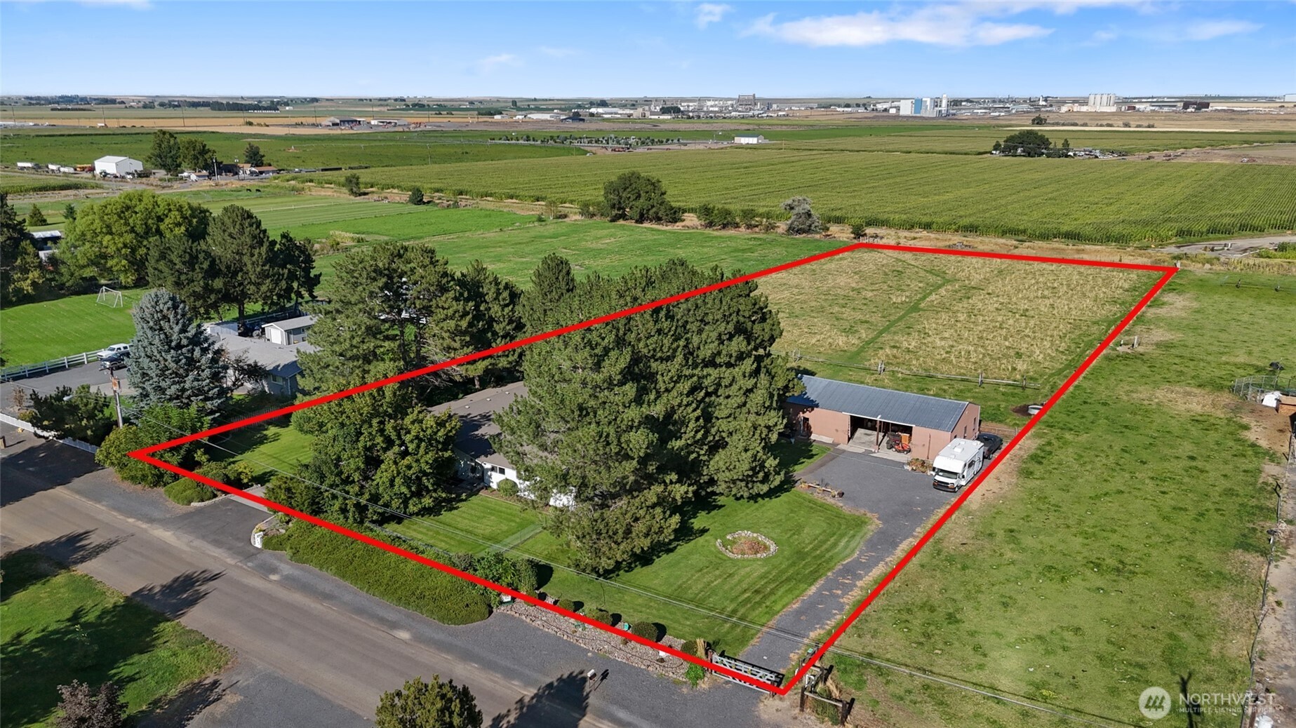 2299 Admiral Road Northeast Moses Lake, WA 98837 - Photo 37 of 40 an aerial view of a golf course with chairs