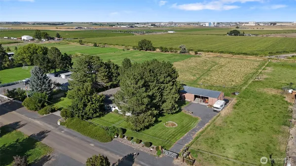 an aerial view of a houses with outdoor space