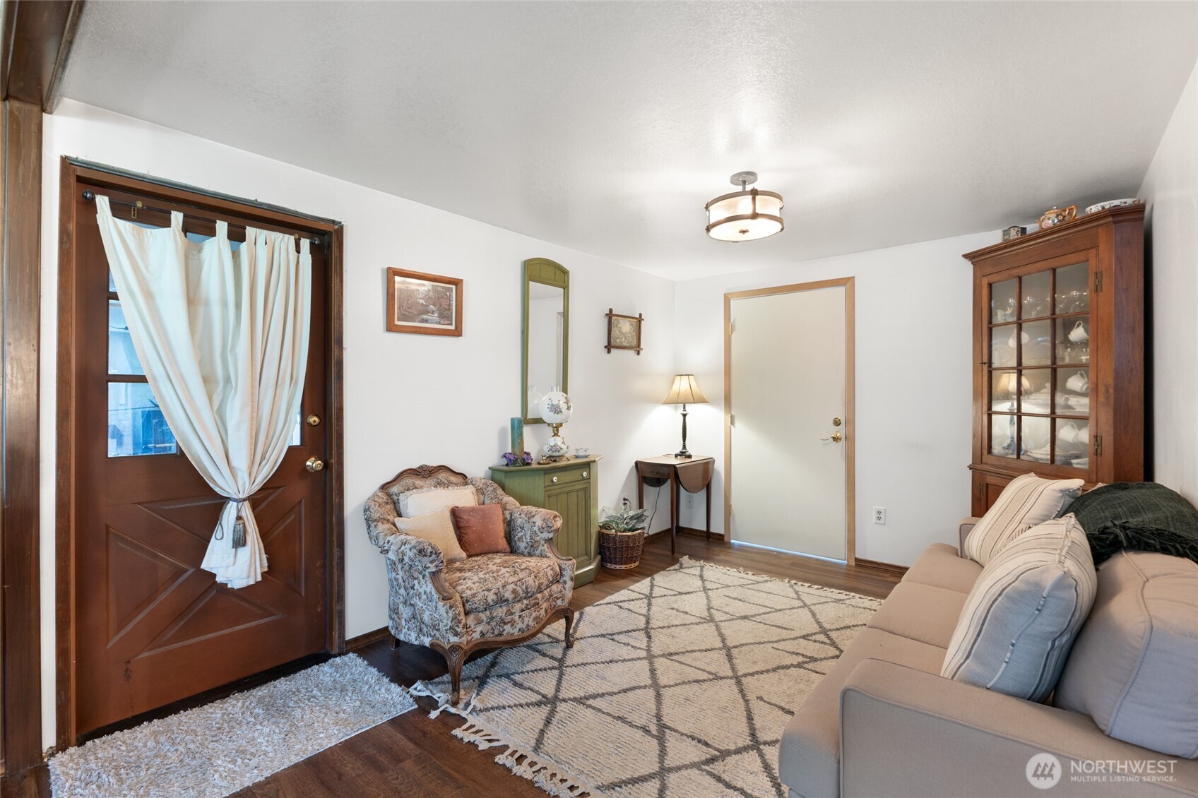 2299 Admiral Road Northeast Moses Lake, WA 98837 - Photo 7 of 40 a living room with furniture and a window