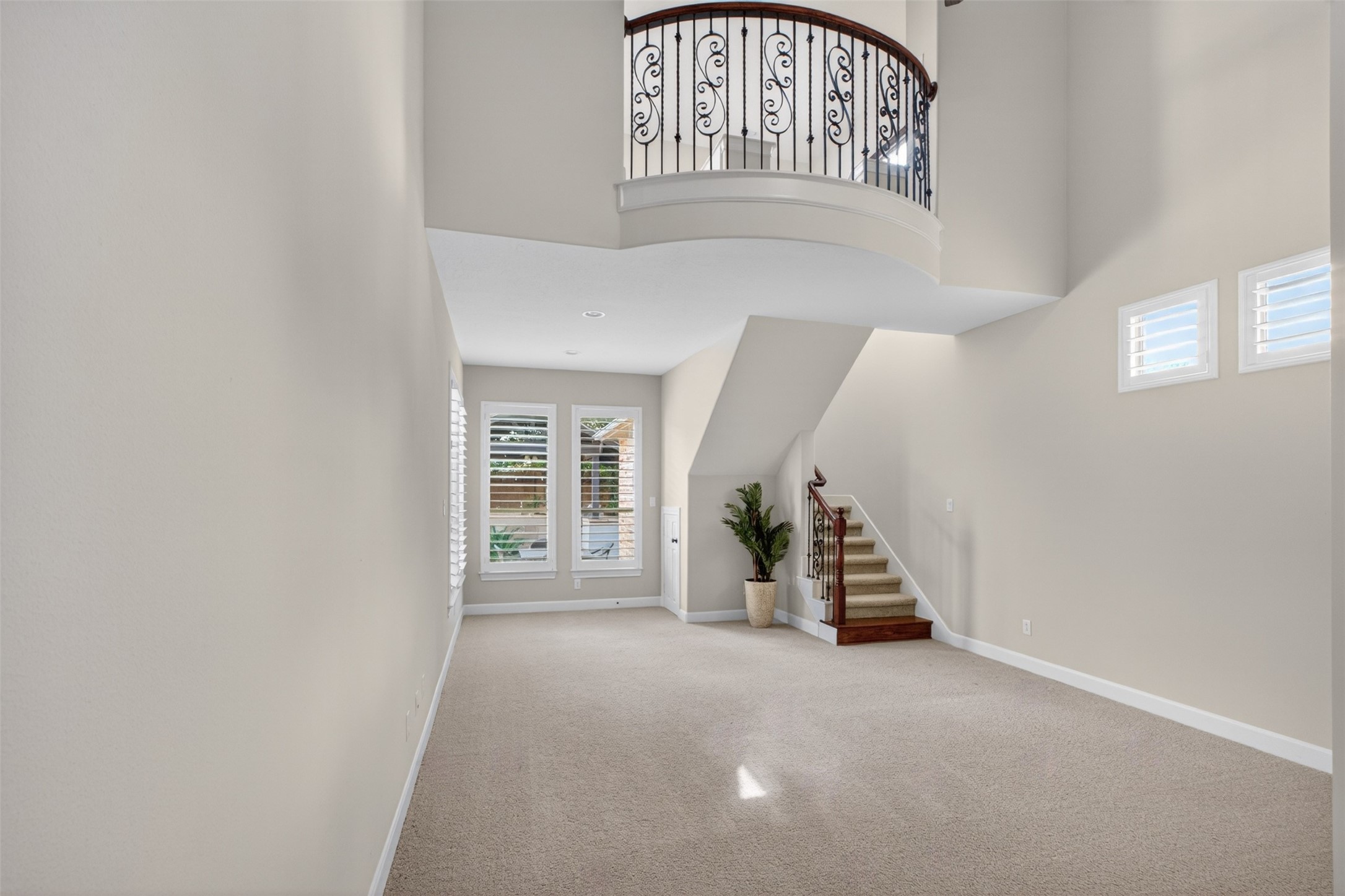 7303 Starry Night Katy, TX 77494 - Photo 16 of 42 Primary bedroom is like no other with a staircase leading to an additional room with a Juliet balcony.