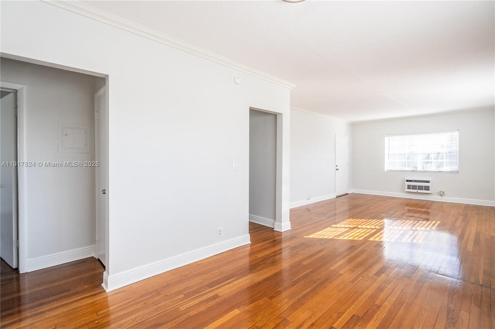 330 84th Street, Unit 12 Miami Beach, FL 33141 - Photo 5 of 20 a view of empty room with wooden floor