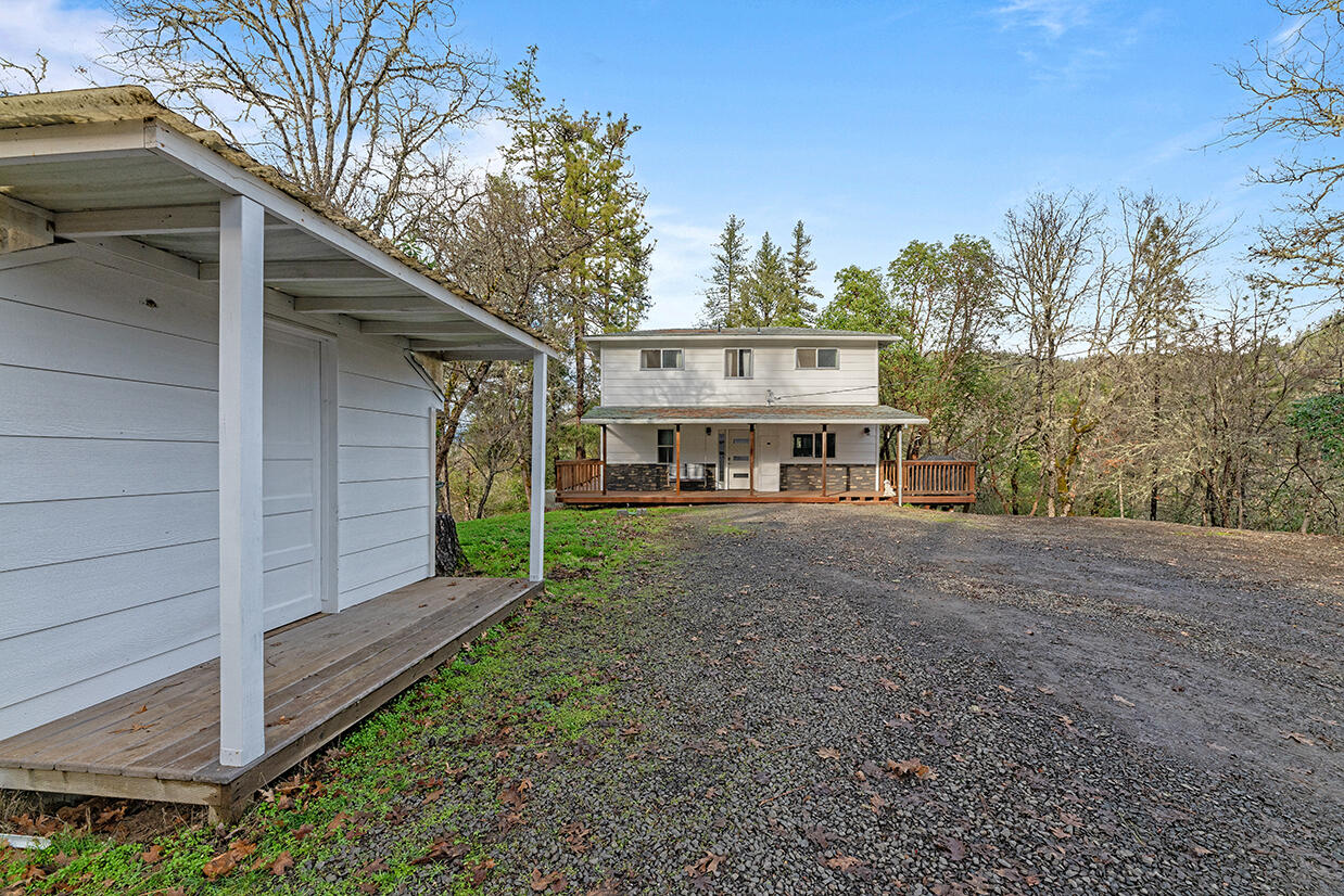 2900 Indian Creek Road Shady Cove, OR 97539 - Photo 26 of 35 a view of a house with a yard