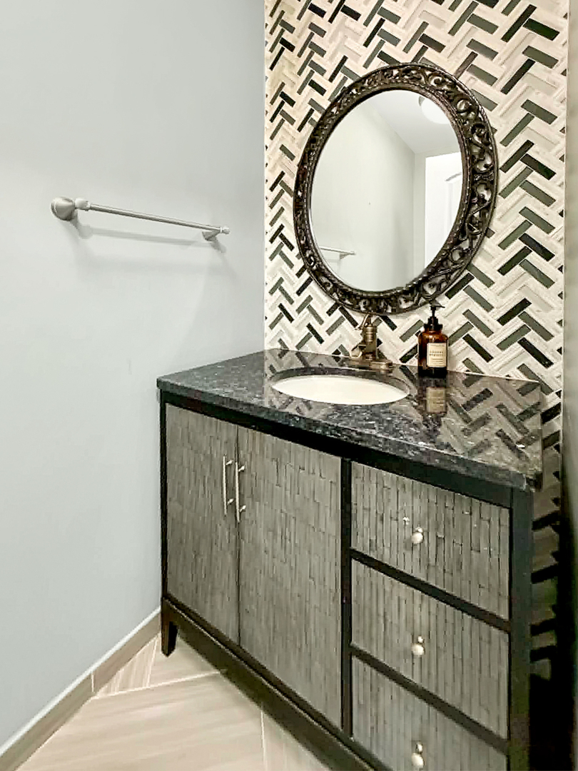 1008 Ascot Drive Rantoul, IL 61866 - Photo 12 of 24 a bathroom with a sink and a mirror
