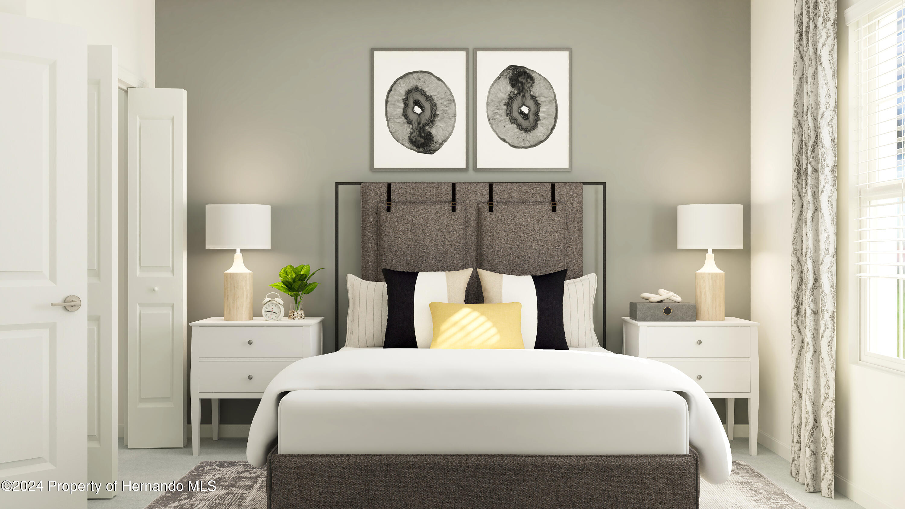 11083 Wishing Cloud Road Land O Lakes, FL 34638 - Photo 3 of 9 a bedroom with a bed and painting on the wall