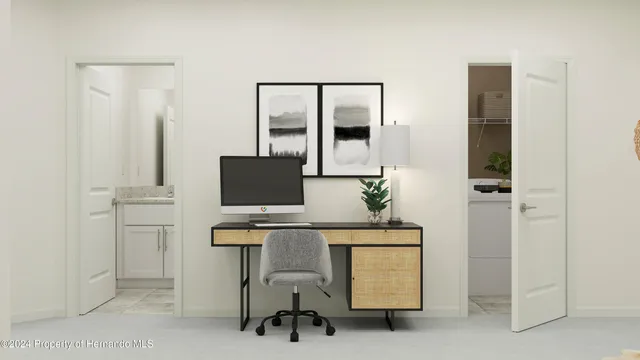 a workspace with furniture and window