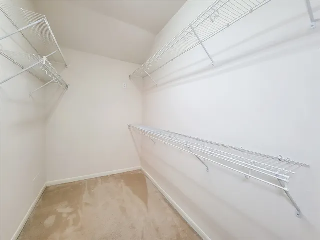 a view of a room with racks on the wall