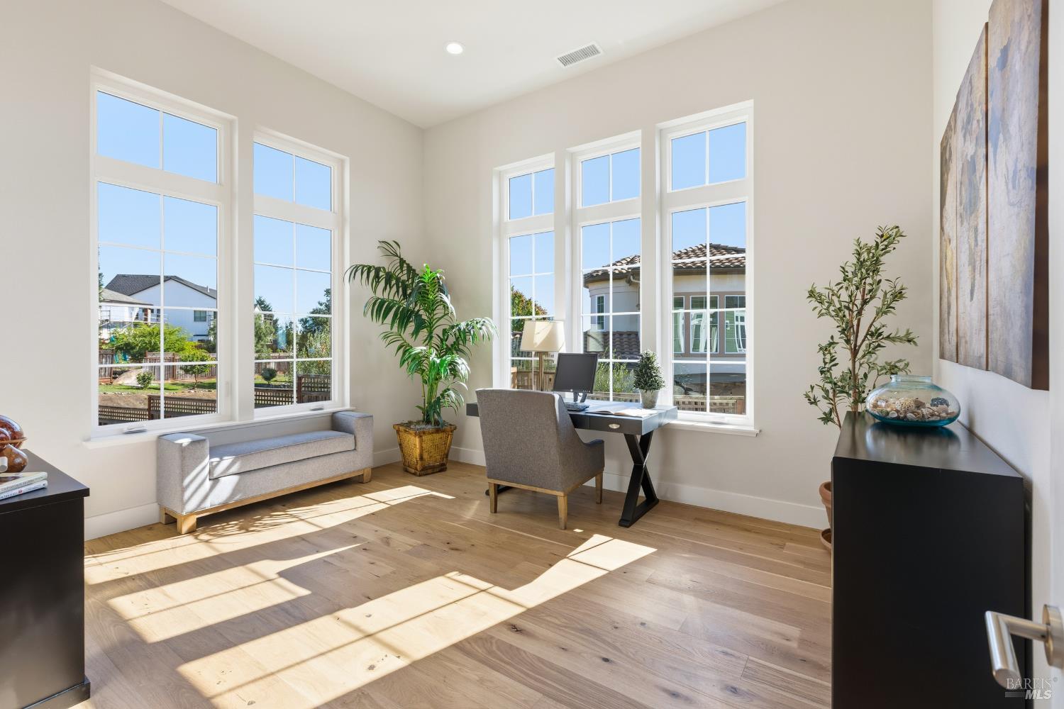 3945 Parker Hill Road Santa Rosa, CA 95404 - Photo 12 of 53 a living room with furniture and a potted plant