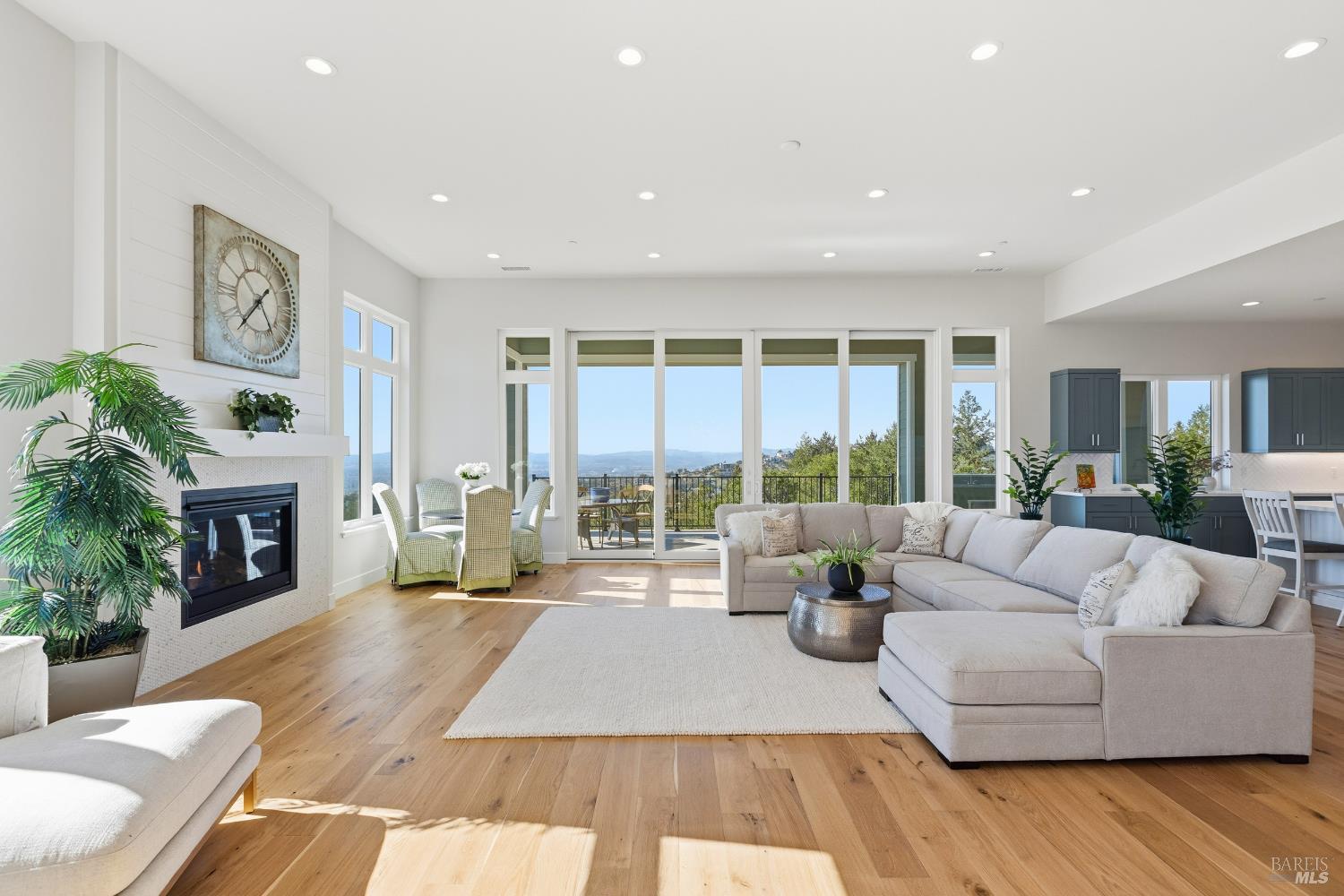 3945 Parker Hill Road Santa Rosa, CA 95404 - Photo 14 of 53 a living room with fireplace furniture and a large window
