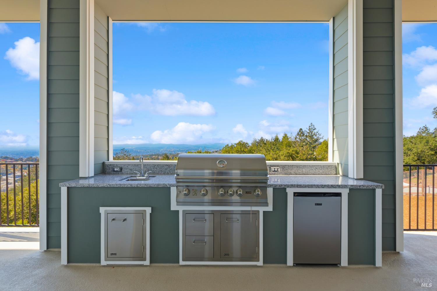3945 Parker Hill Road Santa Rosa, CA 95404 - Photo 16 of 53 Here is a view of the outdoor kitchen (with stainless appliances) under the covered loggia, looking west from the kitchen.