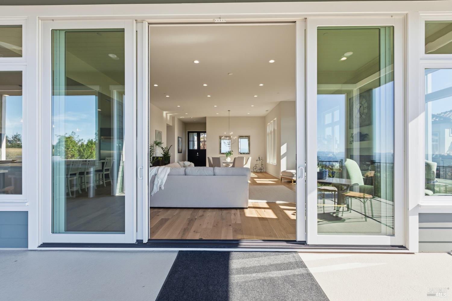 3945 Parker Hill Road Santa Rosa, CA 95404 - Photo 17 of 53 a room with pool table and glass door