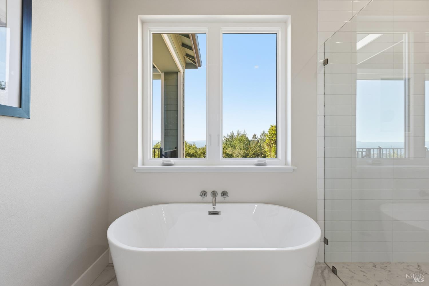 3945 Parker Hill Road Santa Rosa, CA 95404 - Photo 37 of 53 a white bath tub sitting next to a window