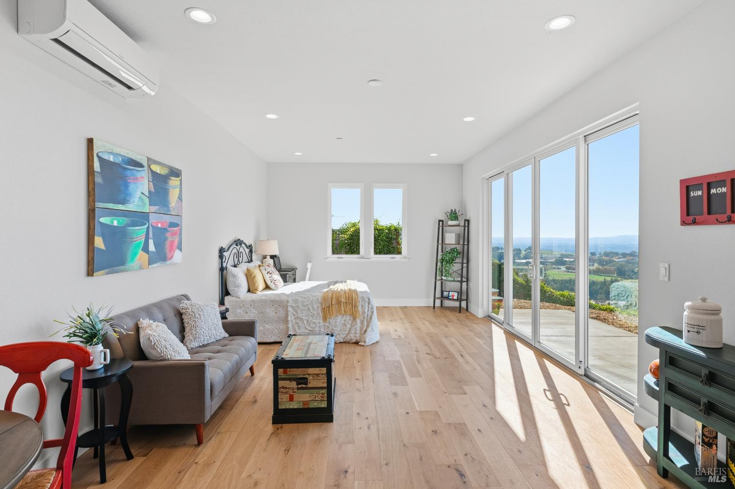 3945 Parker Hill Road Santa Rosa, CA 95404 - Photo 47 of 53 a living room with furniture and a wooden floor