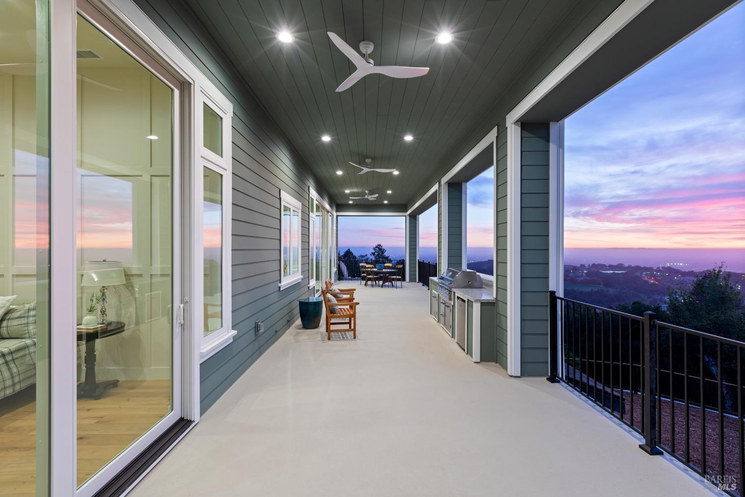3945 Parker Hill Road Santa Rosa, CA 95404 - Photo 8 of 53 a view of a porch with a table and chairs