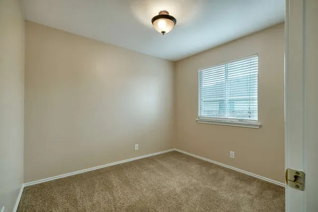 an empty room with a window