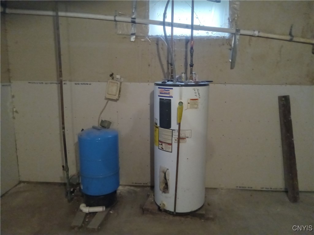 11589 Ferris Road Ira, NY 13033 - Photo 18 of 24 Hot water tank basement