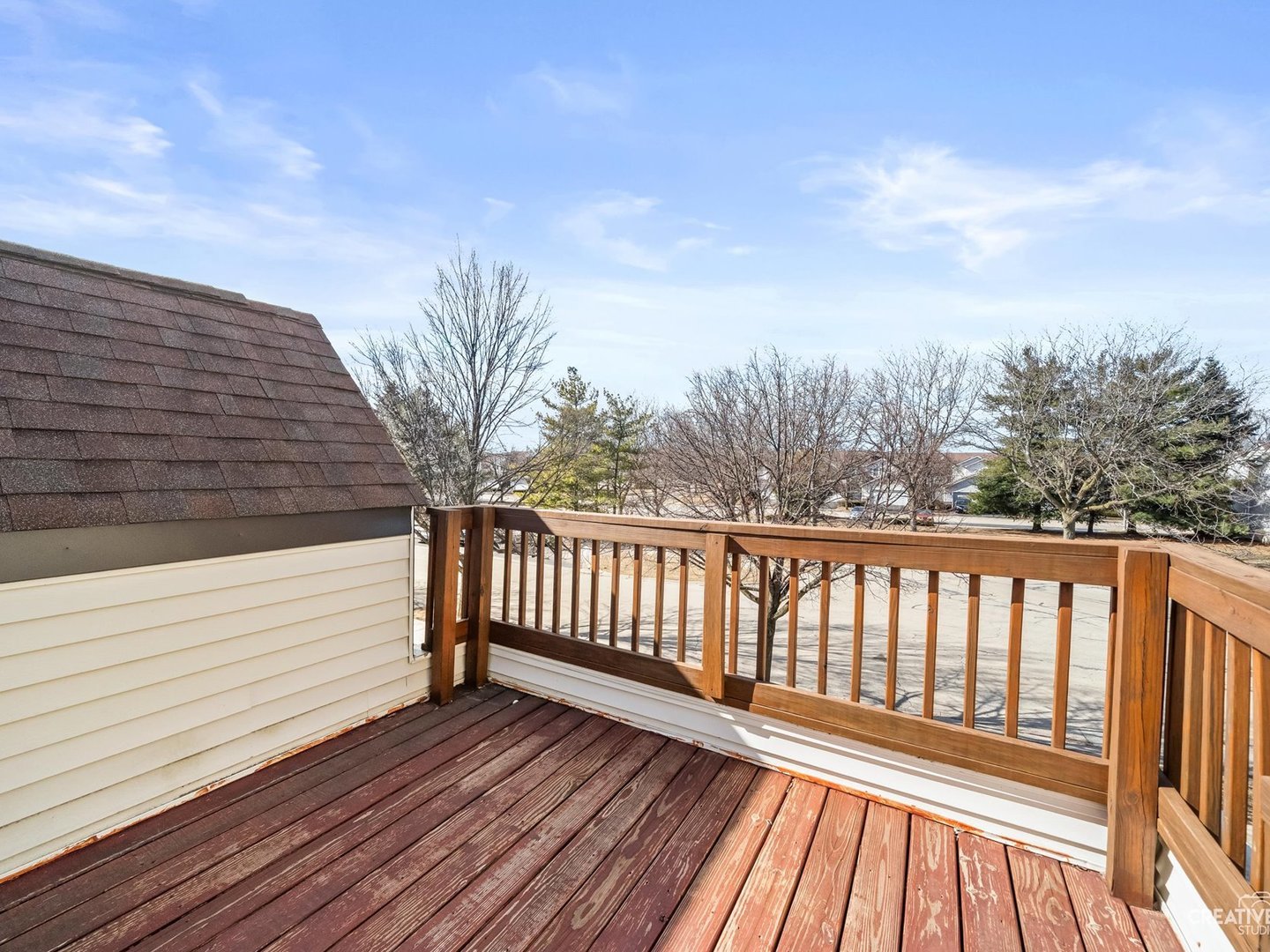 301 Inner Cir Drive Bolingbrook, IL 60490 - Photo 14 of 20 a balcony with wooden floor and fence