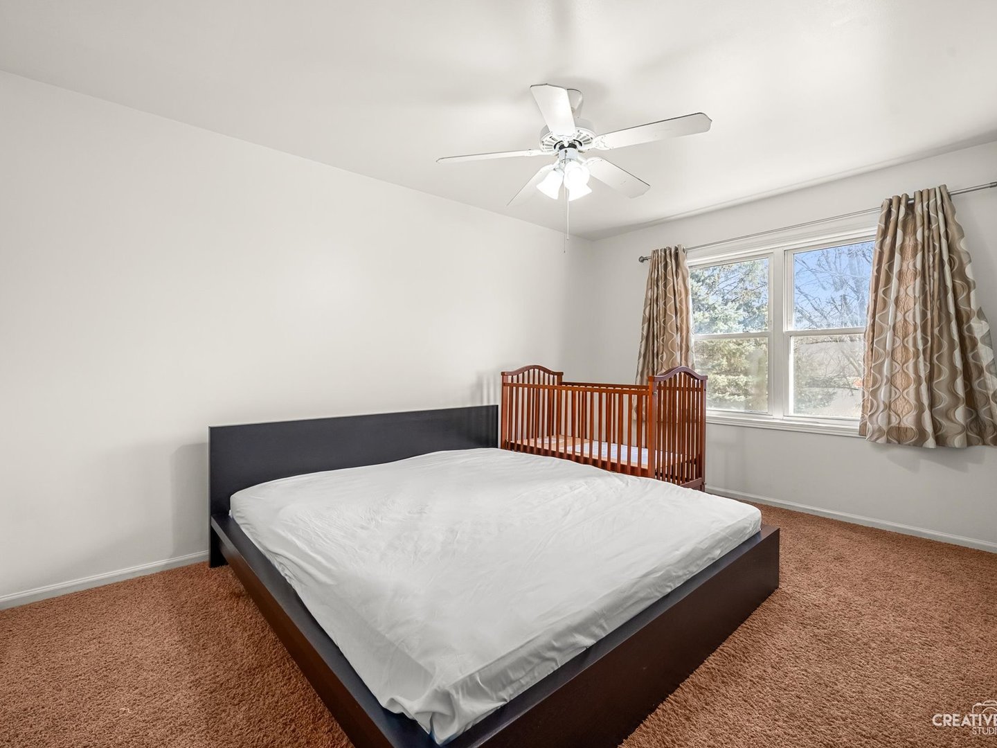 301 Inner Cir Drive Bolingbrook, IL 60490 - Photo 18 of 20 a bedroom with a bed and window