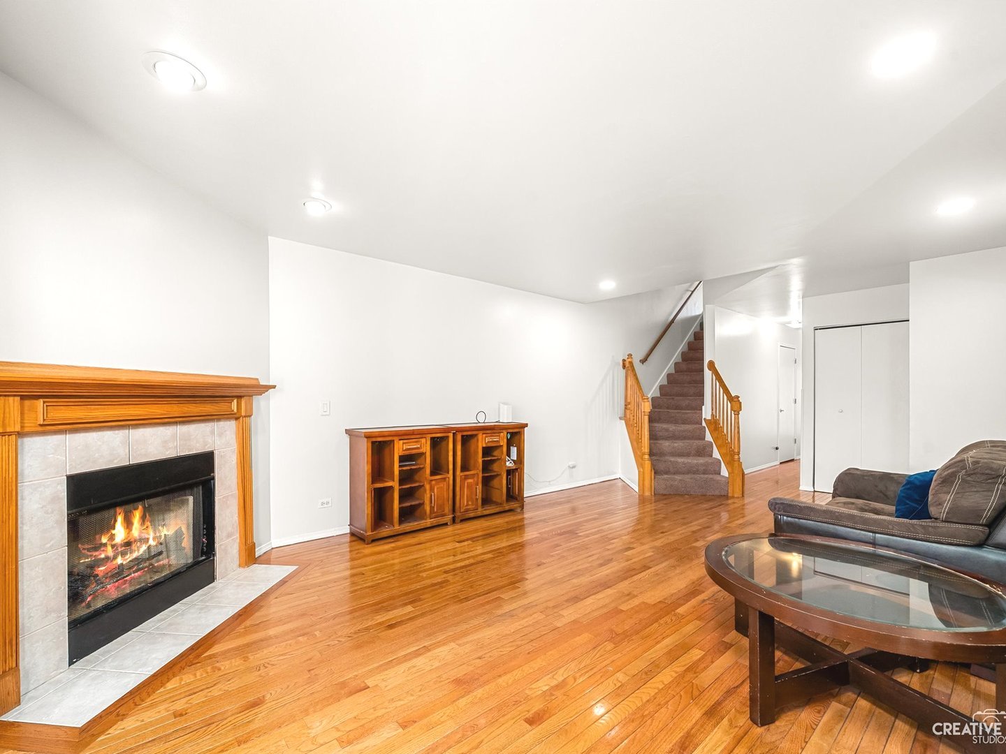 301 Inner Cir Drive Bolingbrook, IL 60490 - Photo 4 of 20 a living room with furniture and a fireplace