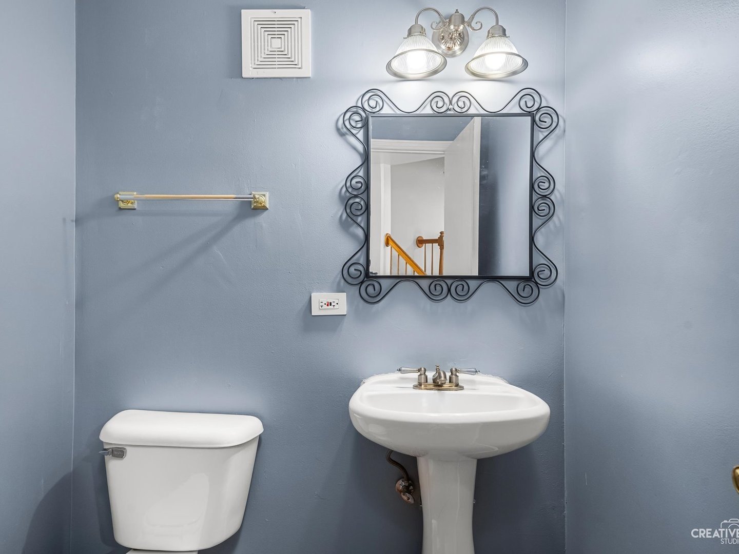 301 Inner Cir Drive Bolingbrook, IL 60490 - Photo 10 of 20 a bathroom with a toilet sink and mirror