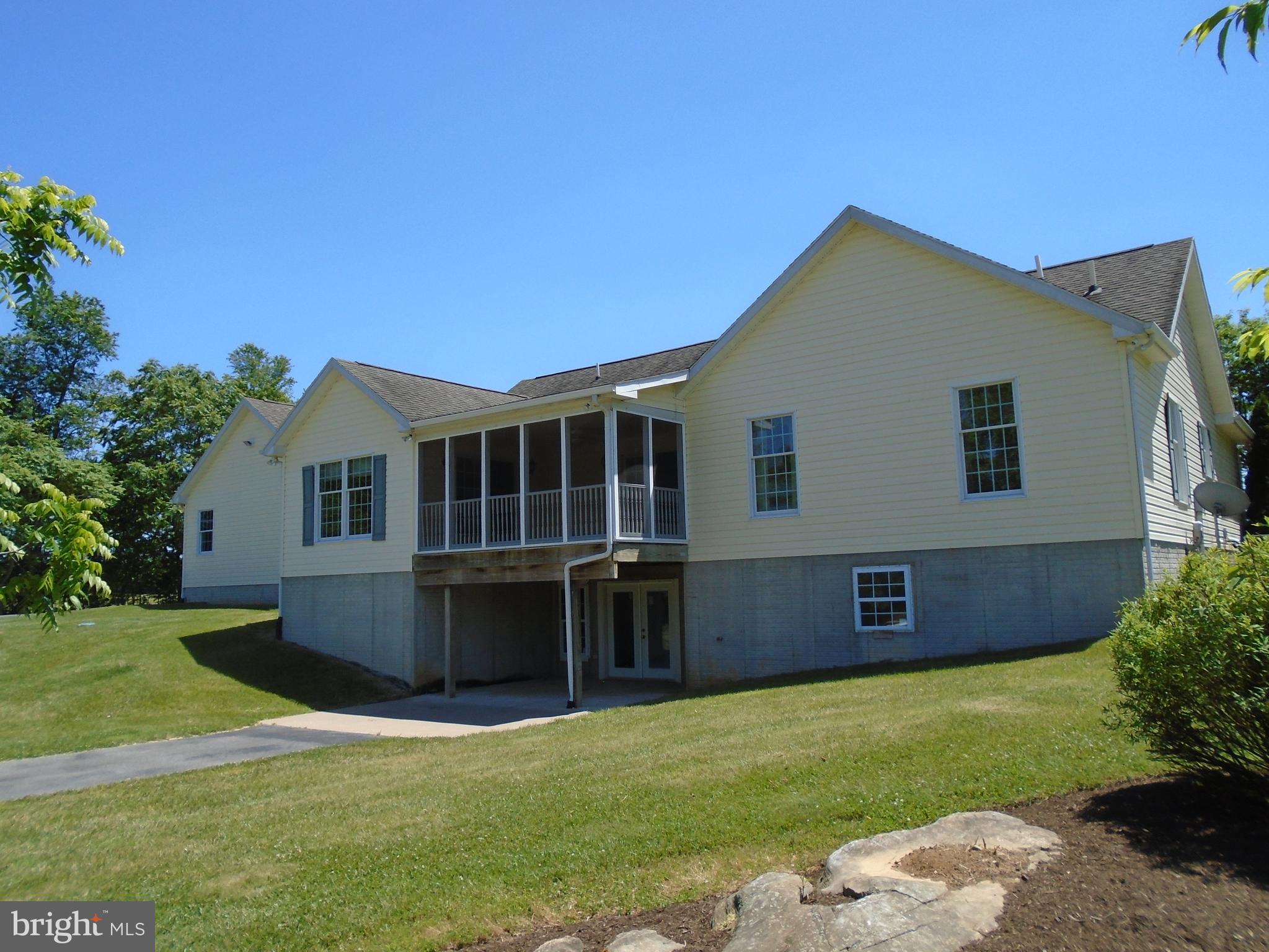 241 French Road Shenandoah Junction, WV 25442 - Photo 2 of 35 Rear picture of home with drive to walkout basemen