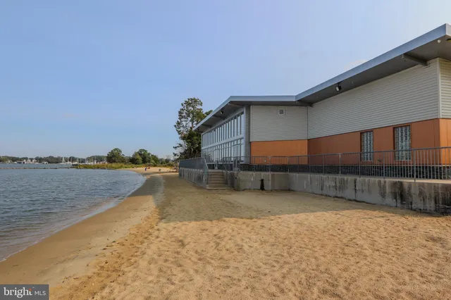 a view of a lake with a building in the background