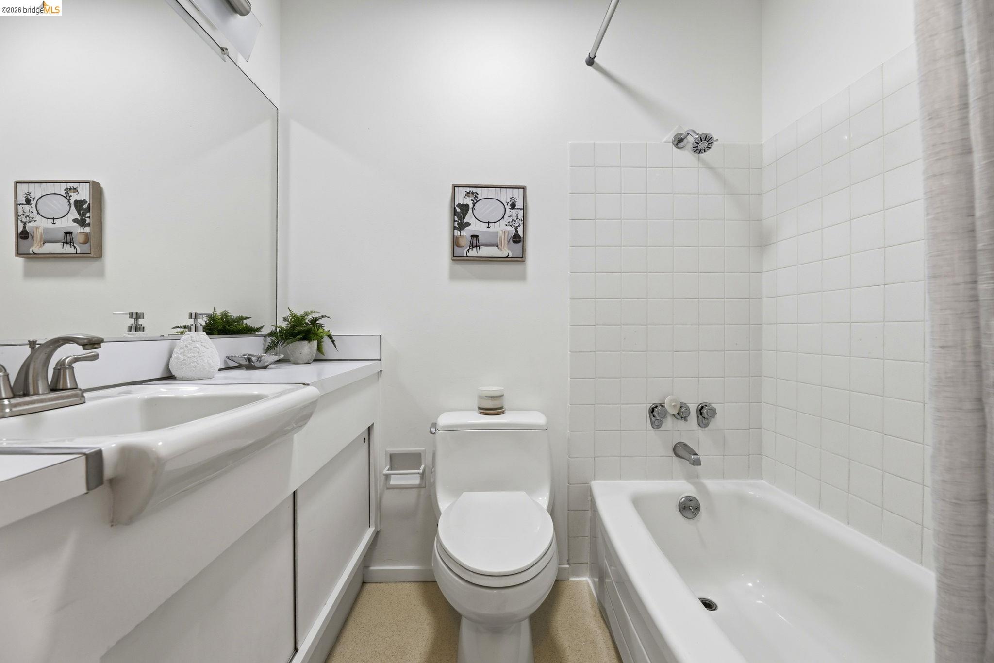 2634 Virginia Street, Unit 33 Berkeley, CA 94709 - Photo 16 of 31 Bathroom with vanity and shower / tub combo